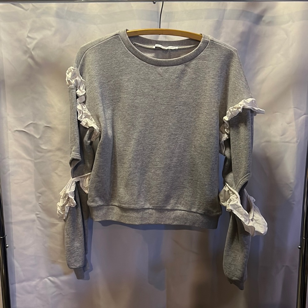 English Factory crewneck with elbow cutout and ruffle detail